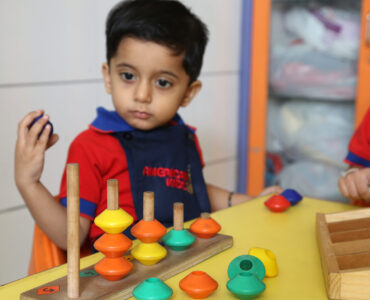 Kid engaged in an activity at a daycare in Pimple Saudagar